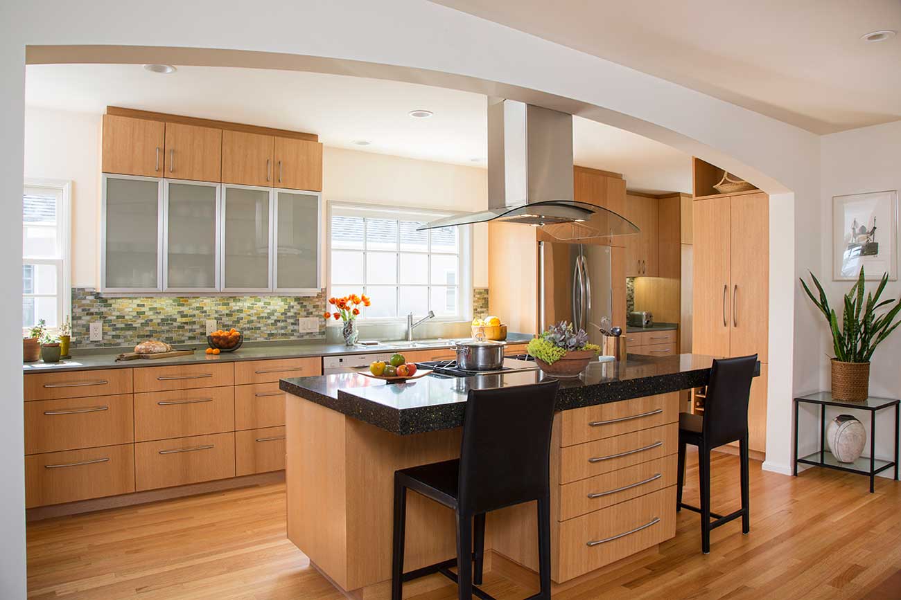 HornKitchen Remodel by HartmanBaldwin - Hartman Baldwin Pre-Launch Interior of remodeled kitchen featuring black countertops, wood cabinetry, and stainless steel appliances.