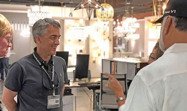 HartmanBaldwin Pasadena Ferguson Construction Interiors - Hartman Baldwin Pre-Launch HartmanBaldwin staff talking to customers surrounded by lighting fixtures.