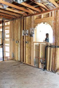 HartmanBaldwin Project Presentation - Hartman Baldwin Pre-Launch HartmanBaldwin staff presenting new project inside with exposed framing.