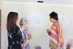 HartmanBaldwin staff presenting new project inside.