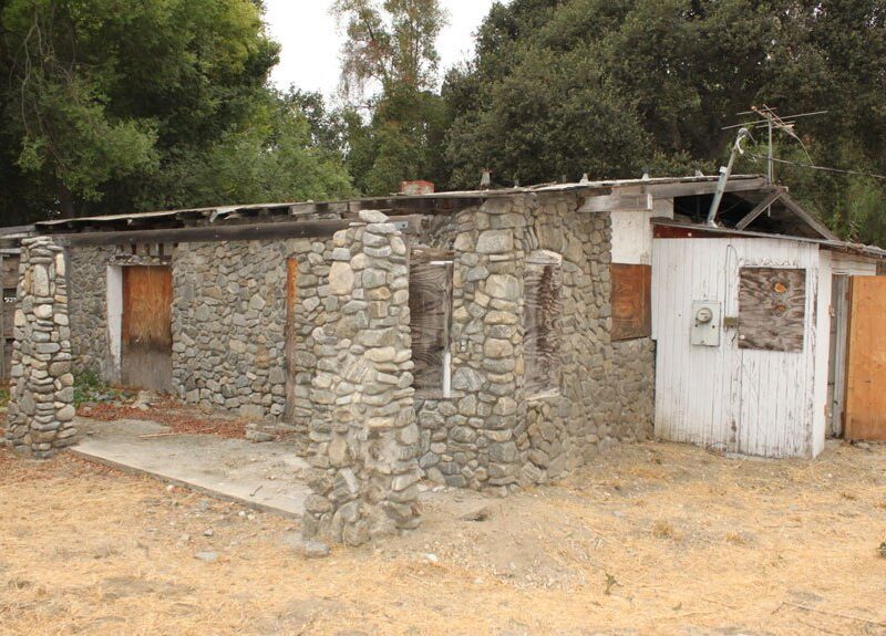 Before image of exterior of canyon architecture project.