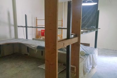 Before image of HartmanBaldwin's update conference room signage.