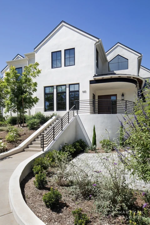 HartmanBaldwin Barrington Residence New Custom Modern Farmhouse Front Exterior - Hartman Baldwin Pre-Launch Los Angeles new custom Modern Farmhouse with white stucco and black trim