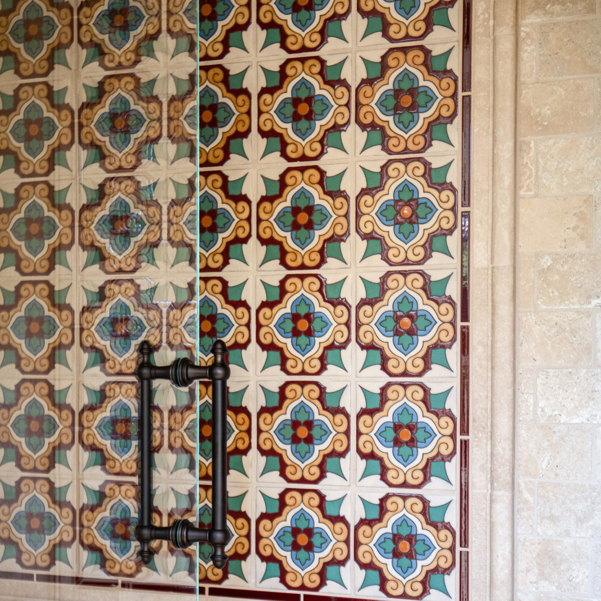 HartmanBaldwin Hill Residence Spanish Style Talavera Tile Shower Crop - Hartman Baldwin Pre-Launch Spanish-style geometric decorative shower tile in cream, red, teal, orange and blue