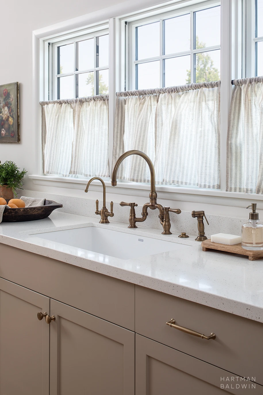 HartmanBaldwin Cambridge Residence California Ranch-Style Remodel Kitchen Sink Kitchen sink with elegant brass faucet