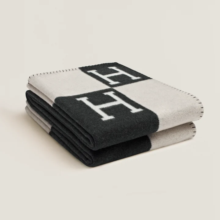 Hermes Avalon Throw Blanket - Hartman Baldwin Pre-Launch Folded black and white blanket with H emblems